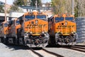 Two BNSF freight trains wait alongside each other Royalty Free Stock Photo