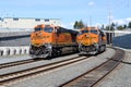 Two BNSF freight trains waiting on a curve Royalty Free Stock Photo