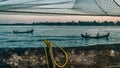 Two boat and Chinese fishing nets at Fort Kochi, Kerala, India Royalty Free Stock Photo