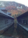Two boathouses on a lake