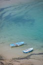 Two boats floating on blue water Royalty Free Stock Photo