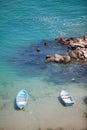 Two boats floating on blue water Royalty Free Stock Photo