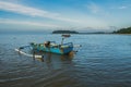 a view of two boats floating near the beach in the morning. Royalty Free Stock Photo