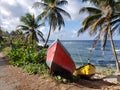 Two boats land docked on the coast of Bathsheba Barbados