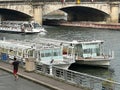 Two boats with the name of two very famous French actors of the past along the Seine in Paris, France