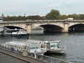 Two boats with the name of two very famous French actors of the past along the Seine in Paris, France