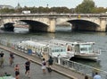 Two boats with the name of two very famous French actors of the past along the Seine in Paris, France