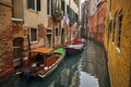 Two boats in a narrow channel in venice Royalty Free Stock Photo