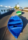 Two boats and palm on the coast. Royalty Free Stock Photo