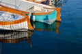 Two boats reflecting in the sea water Royalty Free Stock Photo