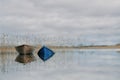 Two boats in a river, cloudy sky. Royalty Free Stock Photo