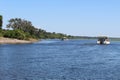 Two boats on river safari in Chobe National park