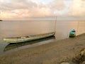 Two boats are on the shores of the lake in the evening time Royalty Free Stock Photo
