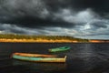 Two boats and stormy sky