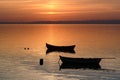 Two boats at sunset