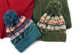 Two bobble ski hats and scarves isolated warm winter clothing Royalty Free Stock Photo