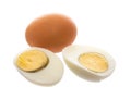 Two boiled eggs, one cut in half. Royalty Free Stock Photo