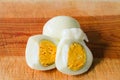 Two boiled eggs placed on a wooden cutting board Royalty Free Stock Photo