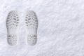 Two boot print in the snow surface white Royalty Free Stock Photo