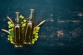 Two bottles of beer On a black wooden table. Royalty Free Stock Photo