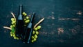 Two bottles of beer On a black wooden table Royalty Free Stock Photo