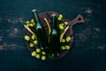 Two bottles of beer On a black wooden table. Royalty Free Stock Photo