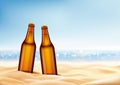 Two bottles with beer in the sand, summer beach Royalty Free Stock Photo