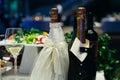 Two bottles of champagne on the wedding table Royalty Free Stock Photo