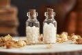 Two bottles of homeopathic pills or globules Royalty Free Stock Photo