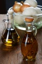 Two bottles of olive oil on table Royalty Free Stock Photo