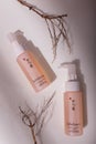 Two bottles, peach colored gentle cleansing foam for face skin washing. Sulwhasoo Korean care