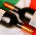 Two bottles of wines with iItalian flag in background Royalty Free Stock Photo