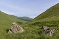 Two Boulders, possibly Glacial Erratics lie at the Head of the Valley in Glen Doll, part of the Cairngorm National Park. Royalty Free Stock Photo