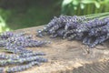 Two bouquets of fresh lavender flowers on an old wooden table on a nature background Royalty Free Stock Photo