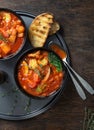 Two bowl Italian soup minestrone with vegetables on wooden table Royalty Free Stock Photo