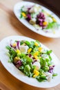 Two bowls of delicious fresh salad with mozzarella and pepper Royalty Free Stock Photo