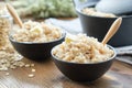 Two bowls of healthy oatmeal porridge on kitchen table