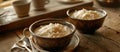 Two bowls of rice pudding on a table, a delicious dessert Royalty Free Stock Photo