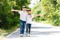 Two boy run in the park