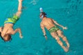 Two boy swim ocean snorkeling mask Summer background Royalty Free Stock Photo