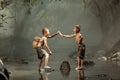 Two boys Catching fish in a stream near the house In the rural areas of Thailand