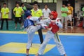 Two boys contest in a Taekwondo competiton Royalty Free Stock Photo