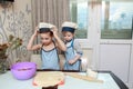 Two Boys Cooking dumplings