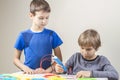 Two boys creating with 3d printing pen Royalty Free Stock Photo