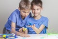 Two boys creating with 3d printing pens Royalty Free Stock Photo