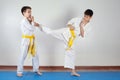 Two boys demonstrate martial arts working together Royalty Free Stock Photo