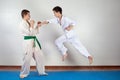 Two boys demonstrate martial arts working together Royalty Free Stock Photo