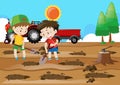 Two boys digging holes on the ground