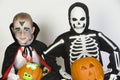 Two Boys Dressed In Halloween Costumes Holding Jack-O-Lanterns Royalty Free Stock Photo