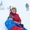 Two boys enjoying winter ski vacation Royalty Free Stock Photo